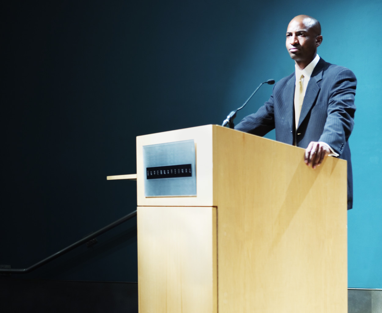 Delivering presentations. Public speaking Podium.